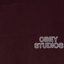 Obey Studios Faded Crew – crewneck sweater met unieke faded wash en subtiele Obey Studios branding