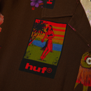 HUF x Thrasher Hawaiian Shirt – bruin overhemd met all-over HUF x Thrasher-print van tiki-maskers, vulkanen en dansers, gemaakt van zachte rayonstof