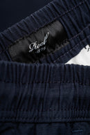 Reell Reflex Easy Cargo Short BR Midnight Indigo – comfortabele cargoshort met stretch, cargozakken en elastische tailleband in indigo blauw