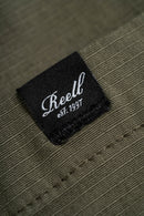 Reell Reflex Easy Cargo Short Baby Rib Olive – olijfgroene cargoshort van baby rib katoen met Reflex-stretch en elastische tailleband