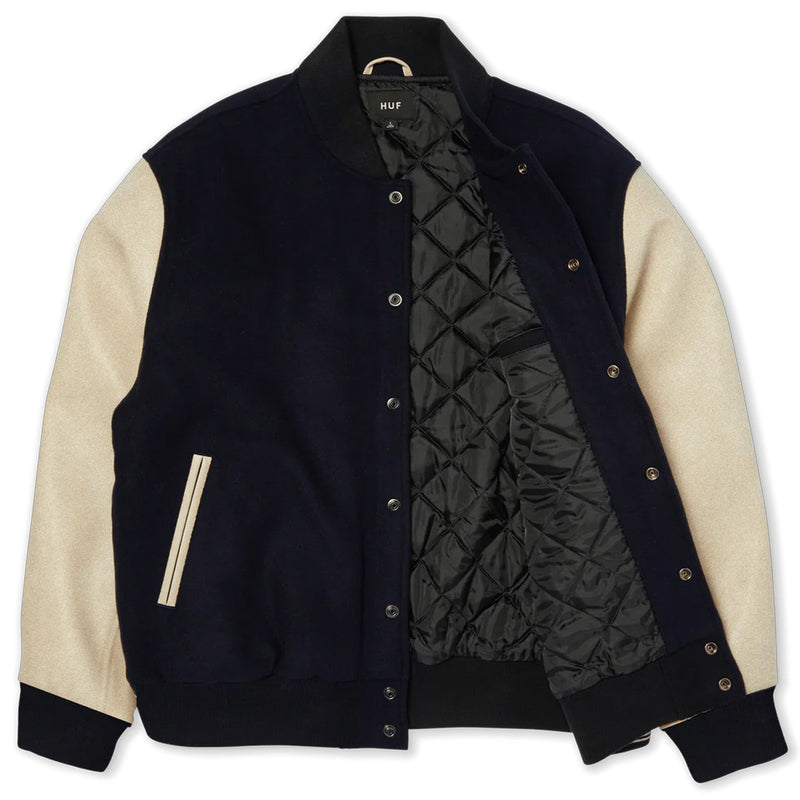 HUF Global Transit Varsity Jacket – zwarte varsity jacket van wolmix met HUF Global Transit-logo’s en contrasterende mouwen