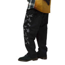 HUF X PLAYBOY VVS DOUBLE KNEE PANT zwart zijkant relaxed fit normal waist broek Revert95.com